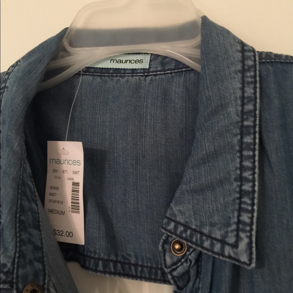 Soft denim button up vest.Size medium. Never worn